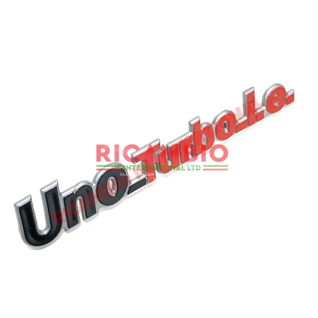 Rear Badge ’Uno Turbo i.e’ - Fiat Uno - Badges & Emblems